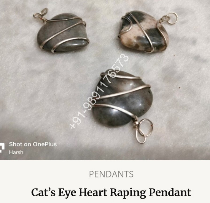 CATS EYE HEART WRAPING PENDANT